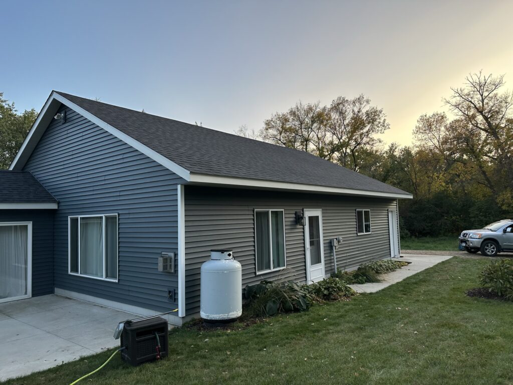 A full roof-and-siding replacement, weather-tight and finished clean — handled start to finish by our own crew.